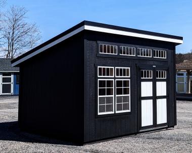 10x14 Lean-To Storage Shed with black LP SmartSide siding full row of transom windows along the high 14' side with two windows and a double door on the same side